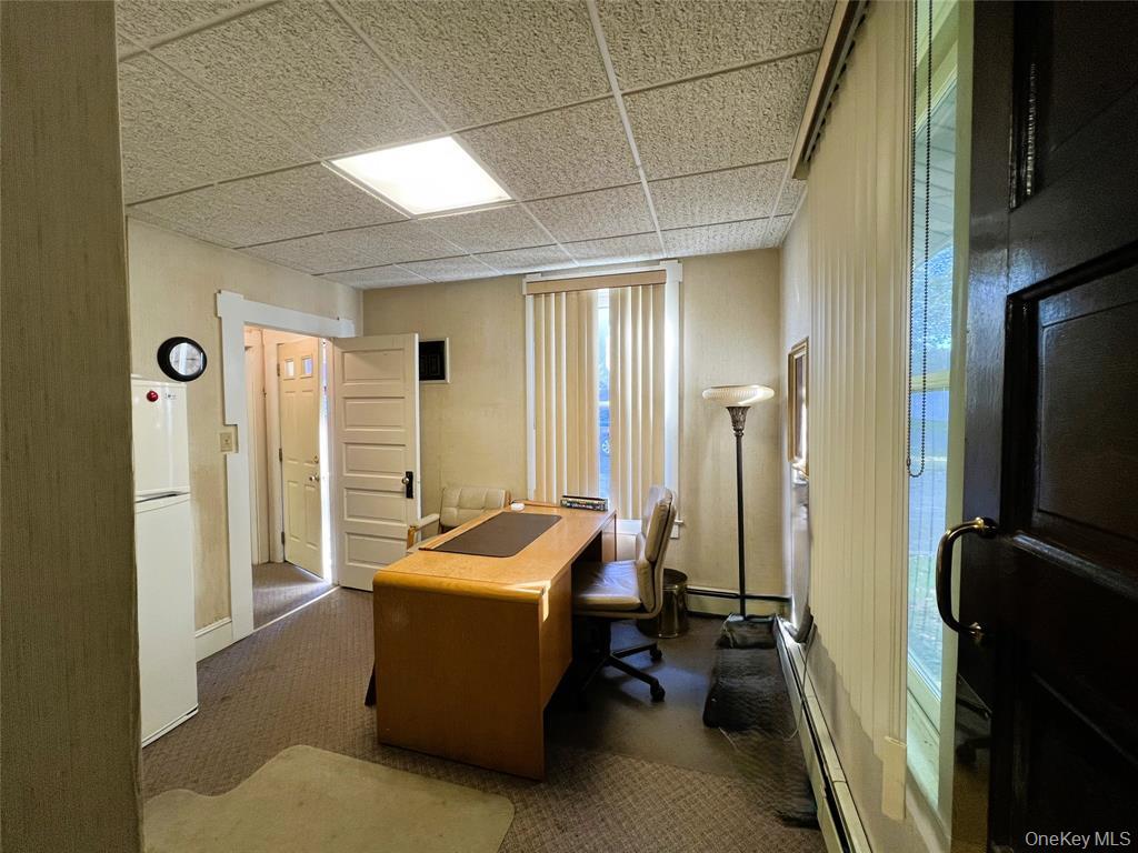 2566 Middle Country Road Centereach, NY 11720 - Photo 22 of 31 a room with pool table and a flat screen tv