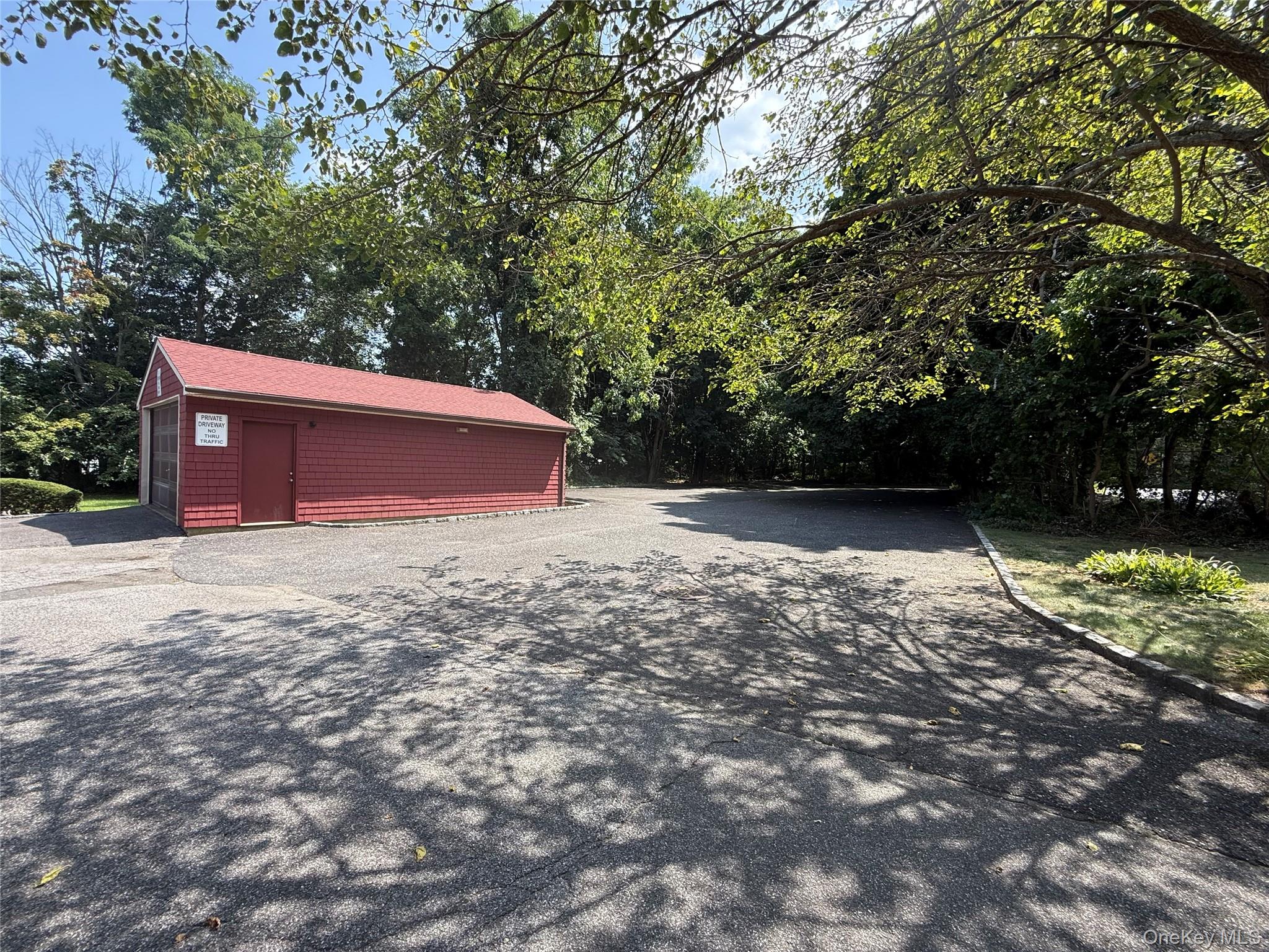 2566 Middle Country Road Centereach, NY 11720 - Photo 27 of 31 a view of outdoor space and yard