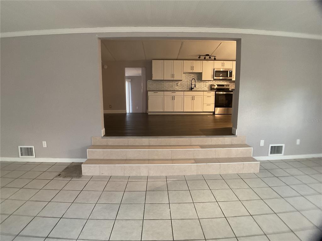 5038 Northeast Sandy Road Arcadia, FL 34266 - Photo 14 of 48 a view of a refrigerator and window