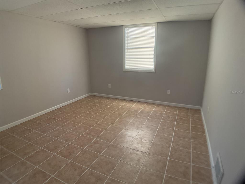 5038 Northeast Sandy Road Arcadia, FL 34266 - Photo 15 of 48 a view of an empty room with a window