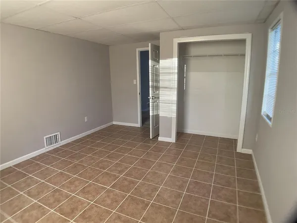 a view of a room that has a window in it