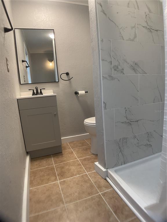 5038 Northeast Sandy Road Arcadia, FL 34266 - Photo 29 of 48 a bathroom with a sink a toilet and a mirror