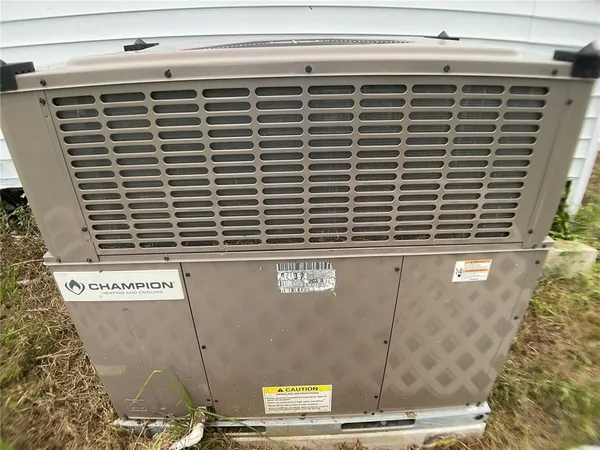 a view of an empty room with stairs