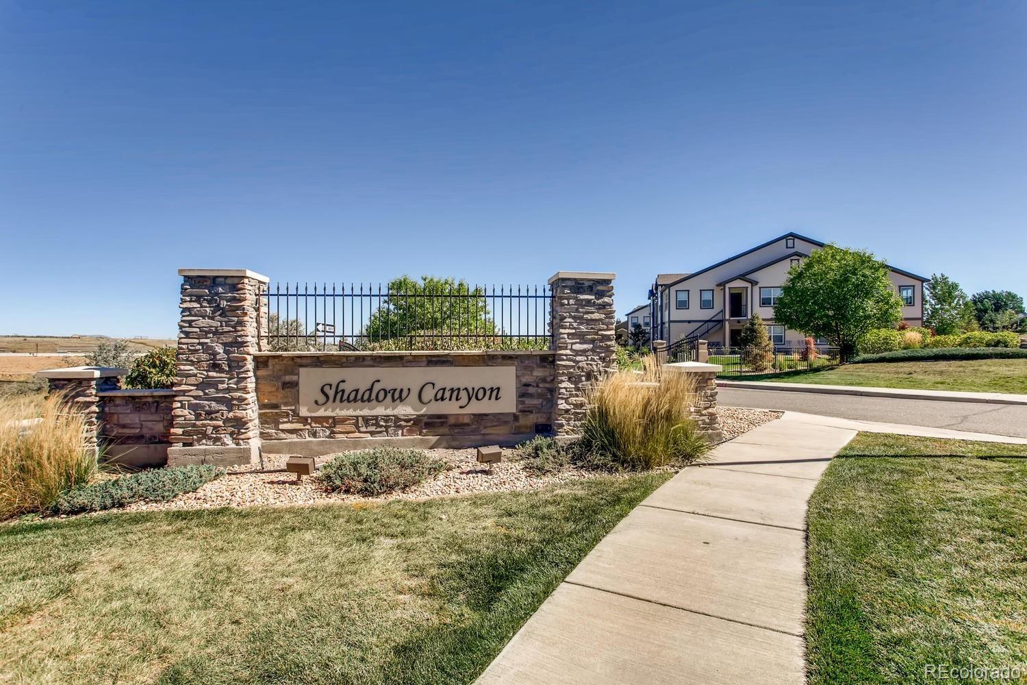 4765 Copeland Circle, Unit 103 Highlands Ranch, CO 80126 - Photo 28 of 28 a view of swimming pool with a lounge chairs