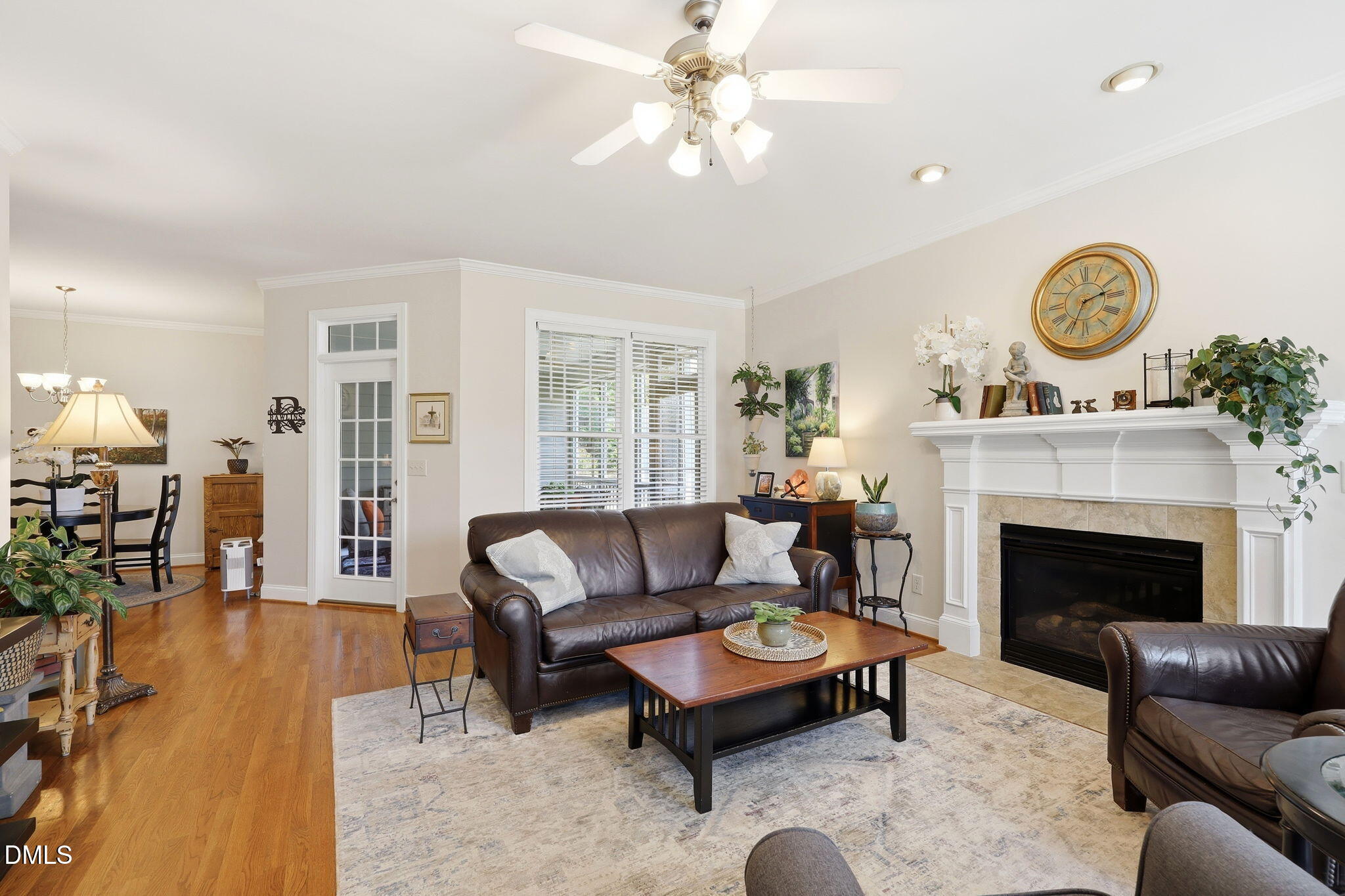 7040 Dayton Ridge Drive Apex, NC 27539 - Photo 6 of 38 a living room with furniture and a fireplace