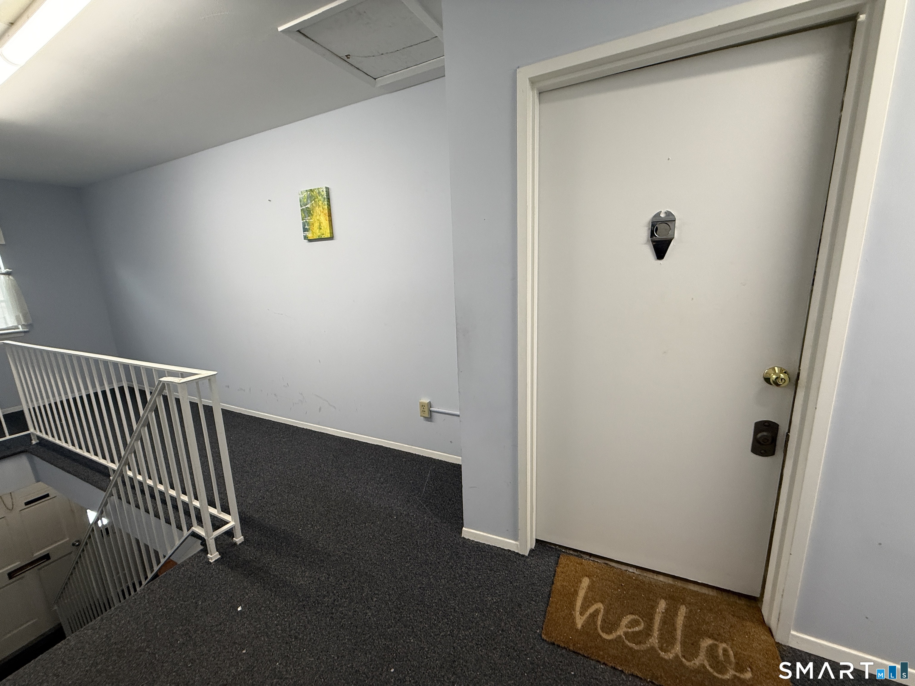 50 Greenhouse Road, Unit 49C Bridgeport, CT 06606 - Photo 14 of 16 a view of a hallway