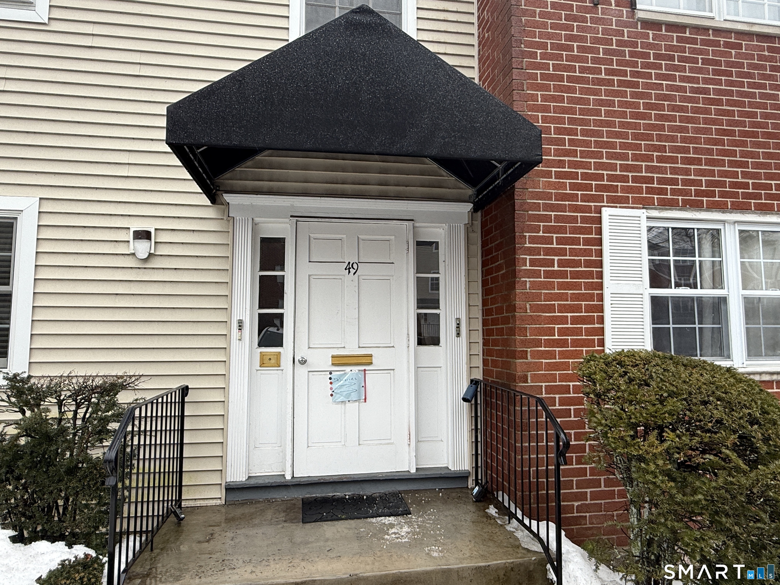 50 Greenhouse Road, Unit 49C Bridgeport, CT 06606 - Photo 15 of 16 a view of front door of house