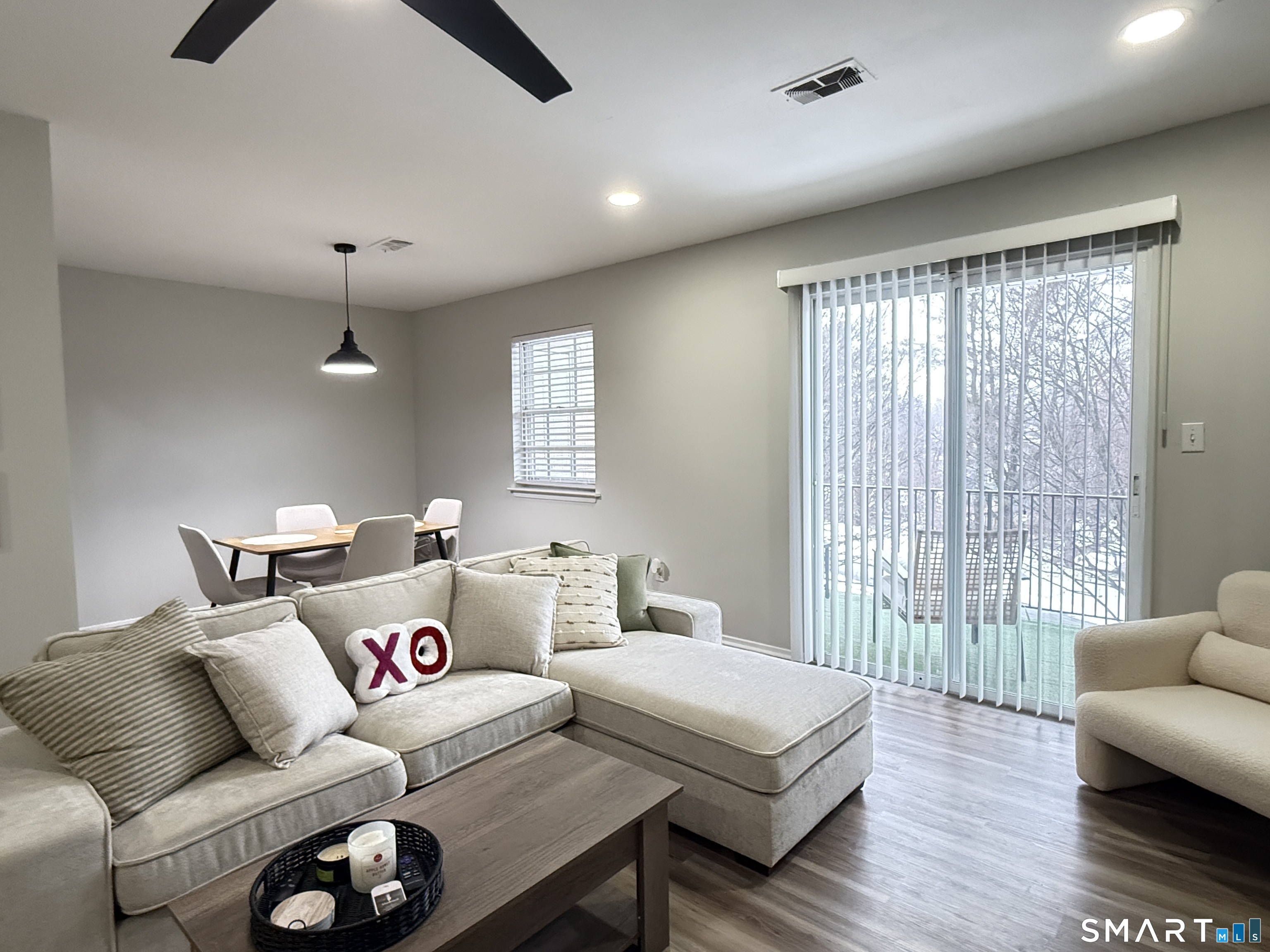 50 Greenhouse Road, Unit 49C Bridgeport, CT 06606 - Photo 5 of 16 a bedroom with furniture and a large window