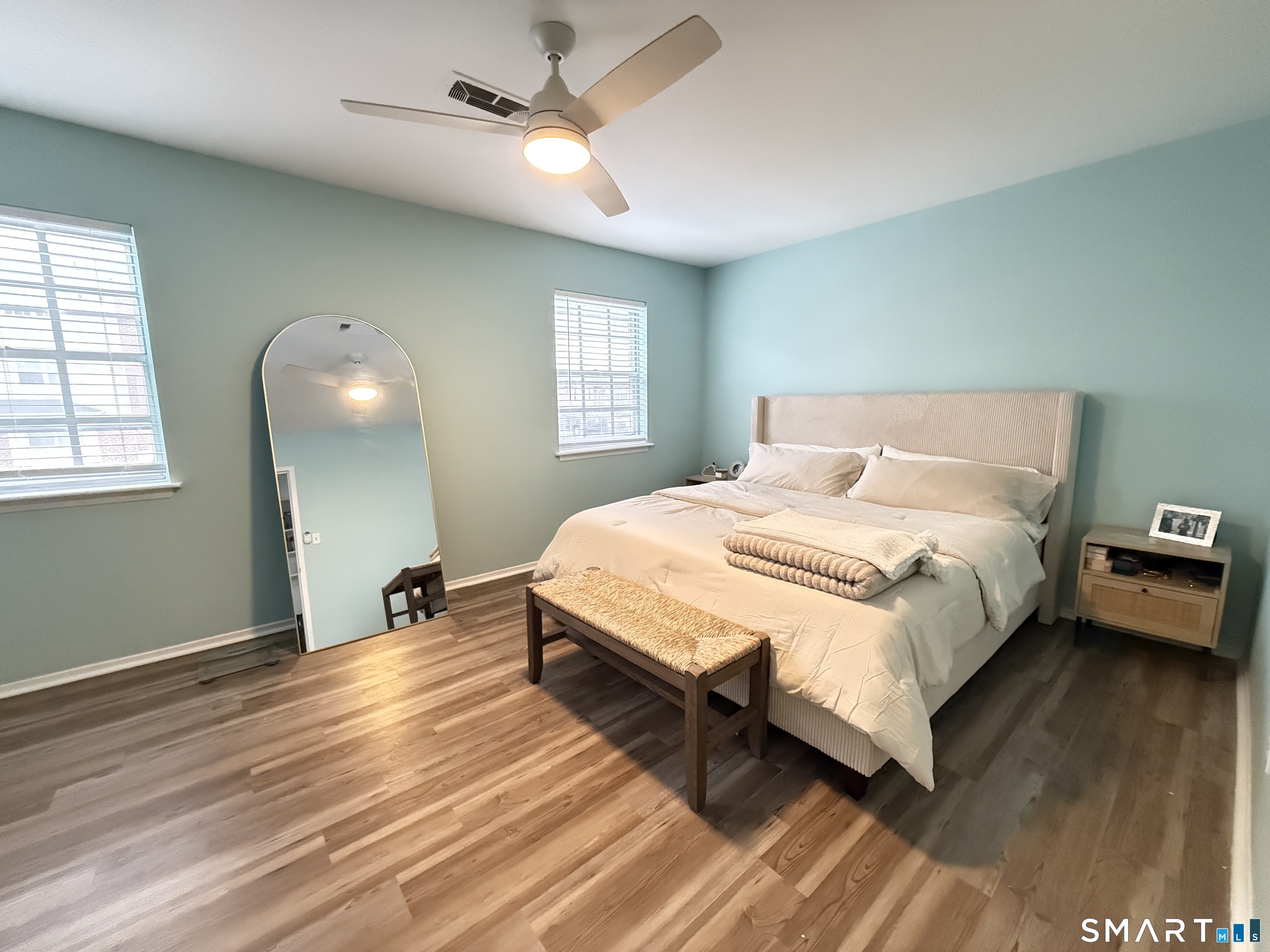 50 Greenhouse Road, Unit 49C Bridgeport, CT 06606 - Photo 10 of 16 a spacious bedroom with a bed and a window