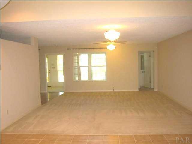 1080 Palisade Road Pensacola, FL 32504 - Photo 5 of 20 Large family room with antique light fixtures