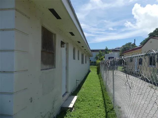 a balcony with view of swimming pool