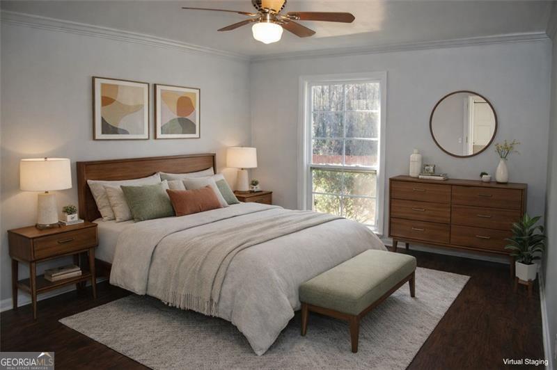 1166 Booth Road, Unit 903 Marietta, GA 30008 - Photo 6 of 15 a bedroom with a bed mirror and a window