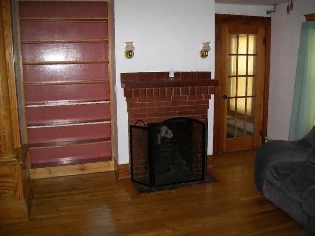a living room with a fireplace