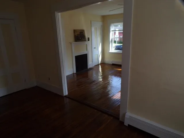 a view of livingroom and hardwood floor