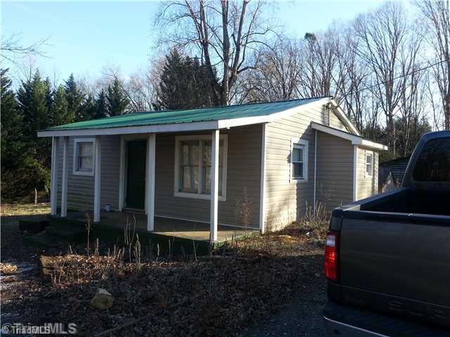 208 Romey Brown Road Siloam, NC 27047 - Photo 1 of 7 Exterior Front.
