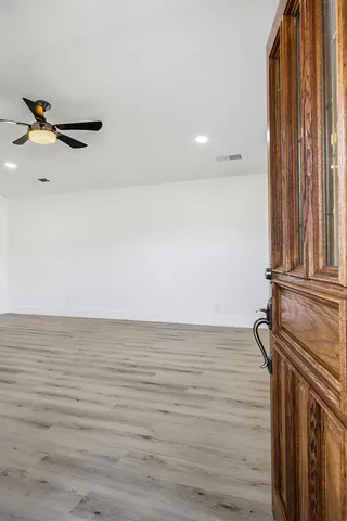 a view of a room with rack on the wall