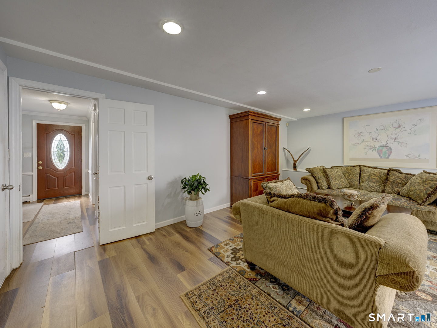 4 Lee Circle Bloomfield, CT 06002 - Photo 7 of 38 Family room with view of entrance foyer