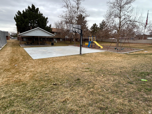 939 South Freedom Boulevard, Unit 13 Provo, UT 84601 - Photo 25 of 26 View of basketball court with a playground and basketball court