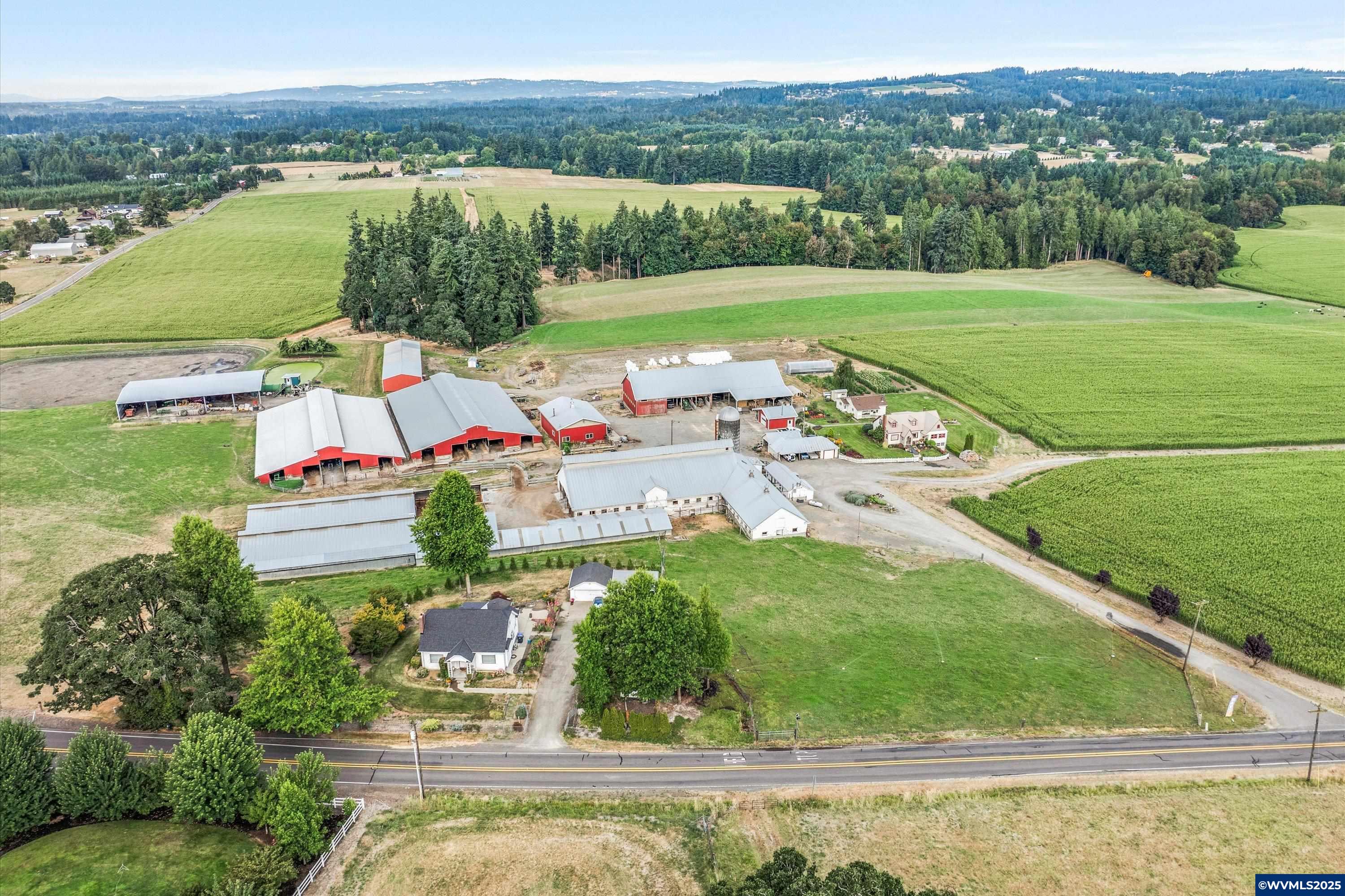 21303 South Central Point Road Canby, OR 97013 - Photo 1 of 50 a view of a lake with a yard