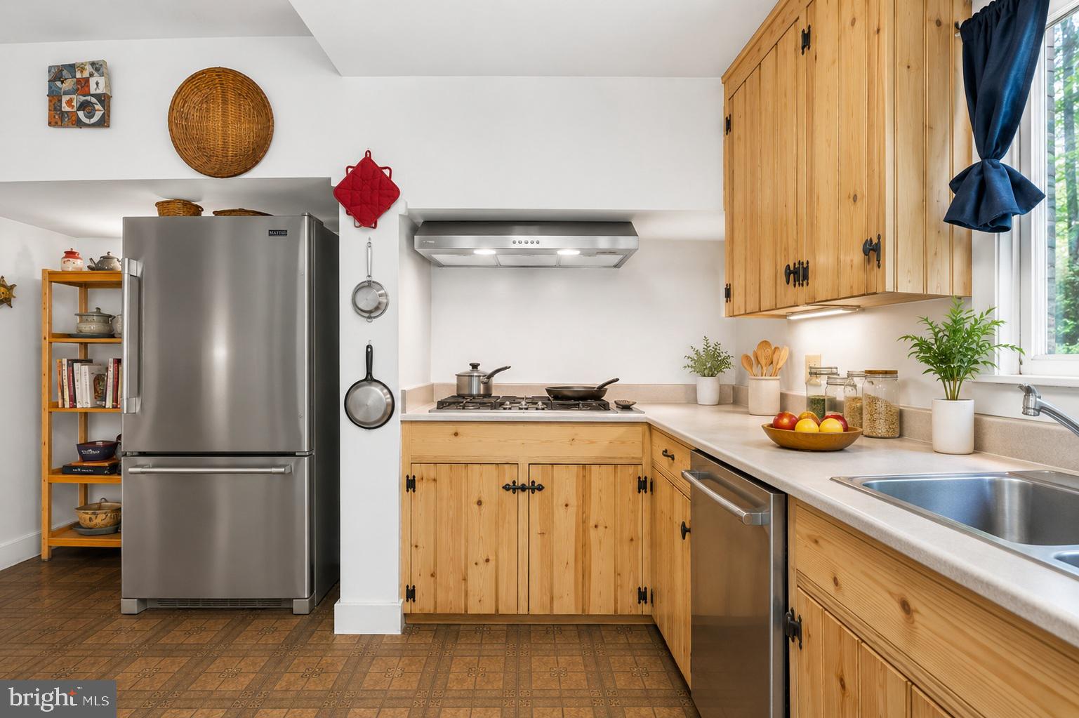 150 Cooks Glen Road Spring City, PA 19475 - Photo 20 of 37 a kitchen with sink refrigerator and cabinets