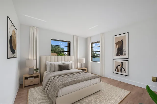 a patio with a table and chairs under an umbrella