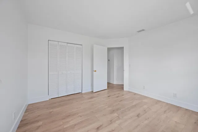 a view of yard with swimming pool and green space