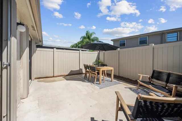 an aerial view of a house with a lake view