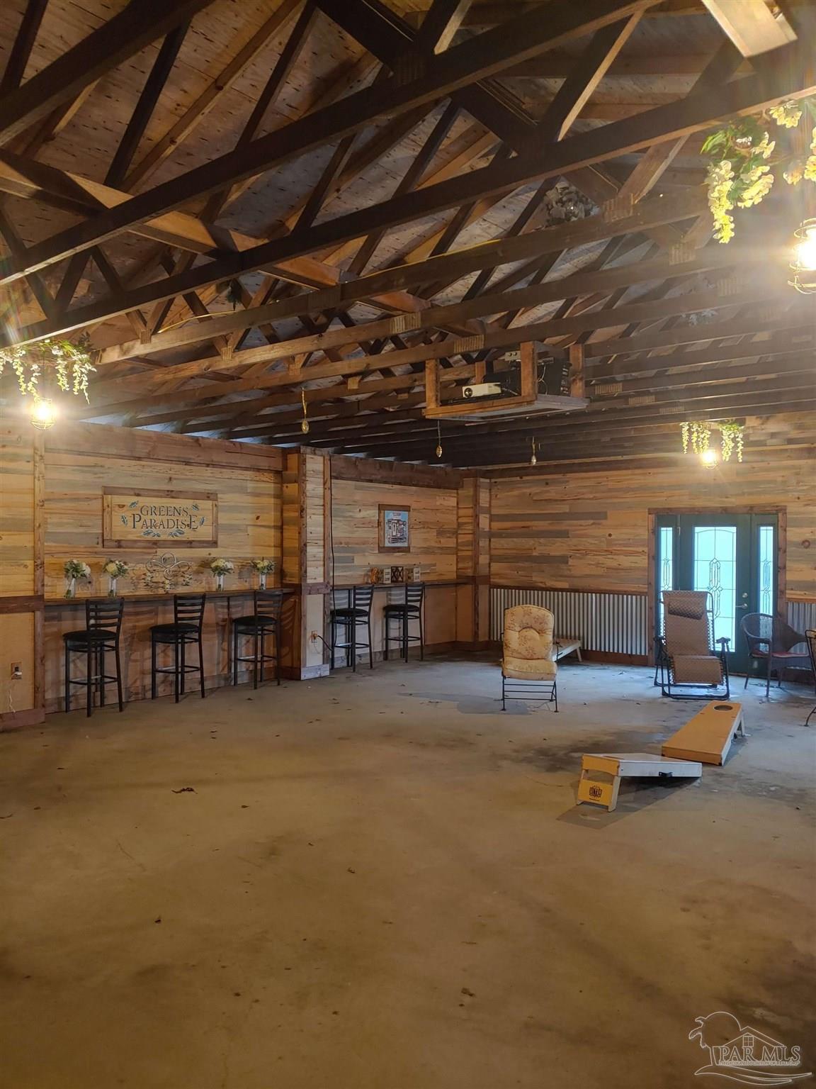 4874 Seely Road Molino, FL 32577 - Photo 5 of 10 a view of a room with gym equipment