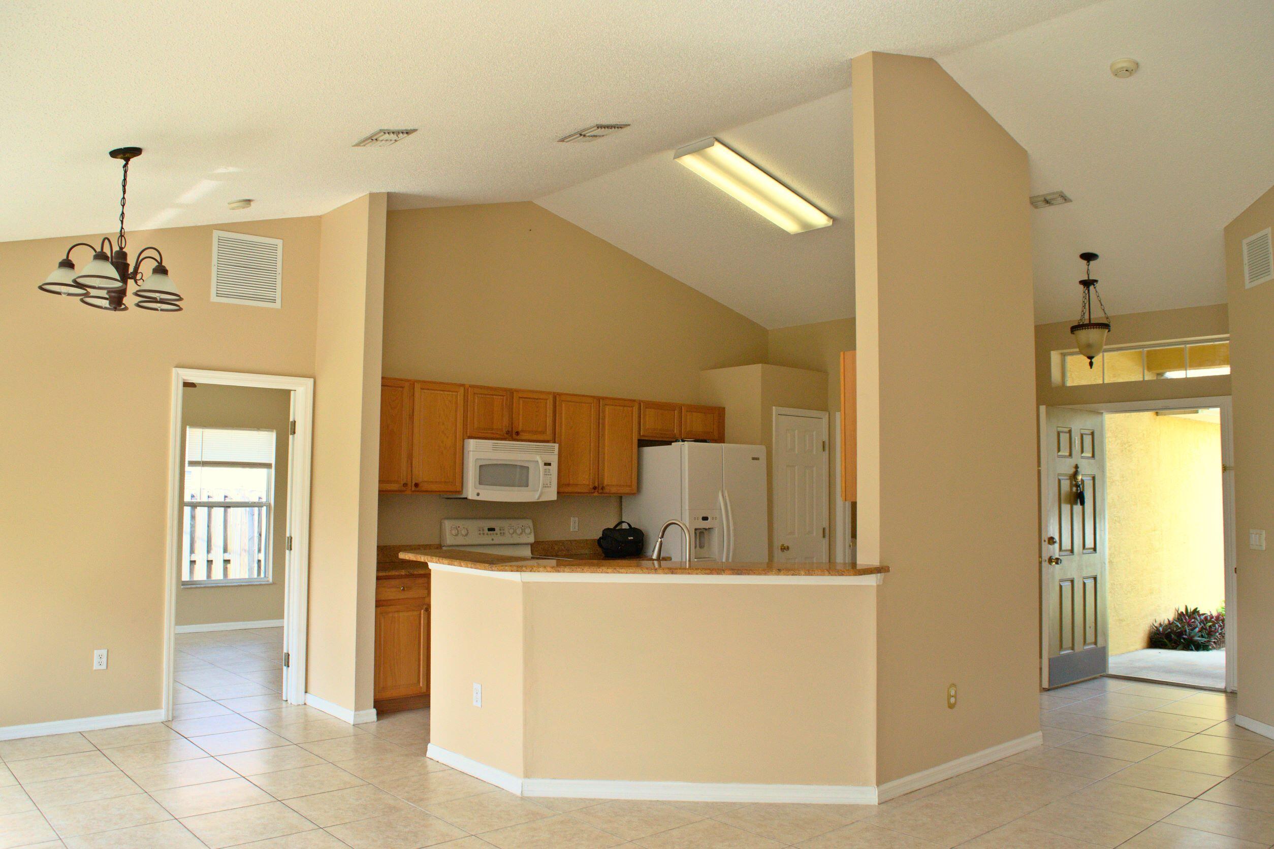 2386 Southwest Neal Road Port St. Lucie, FL 34953 - Photo 4 of 18 Kitchen/Dining