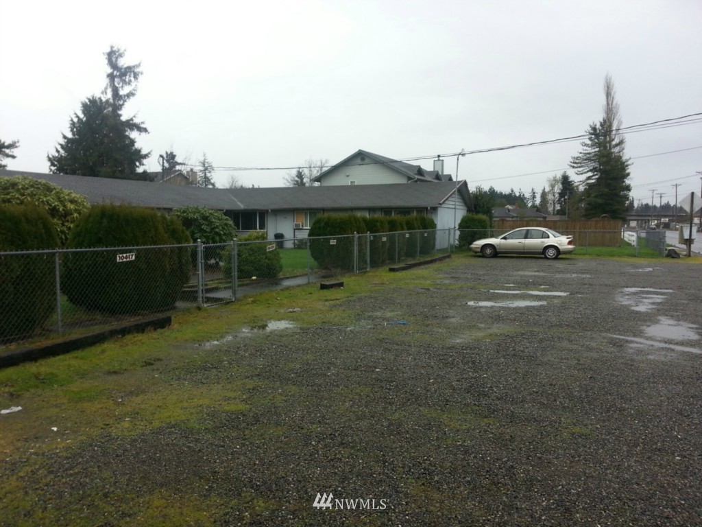 10415 Golden Given Road East Tacoma, WA 98445 - Photo 4 of 14 a view of outdoor space with deck and yard