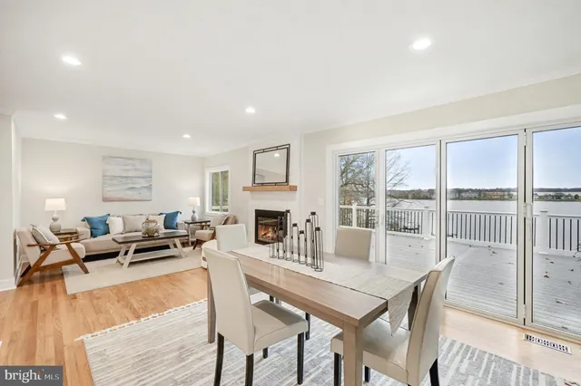 a living room with furniture and a lamp