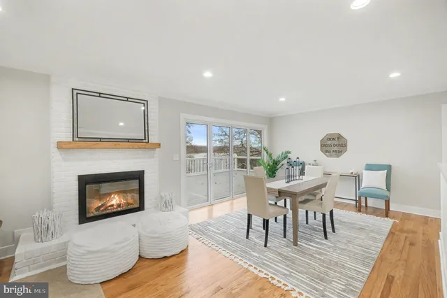 a bed room with a bed and mirror