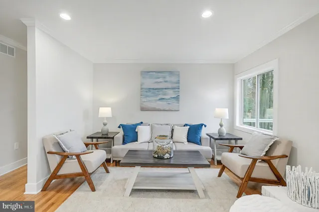 a bedroom with a bed and a lamp