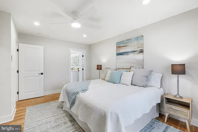 a picture of a bathroom with a sink and a shower