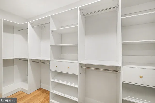 a view of storage and utility room with washer and dryer