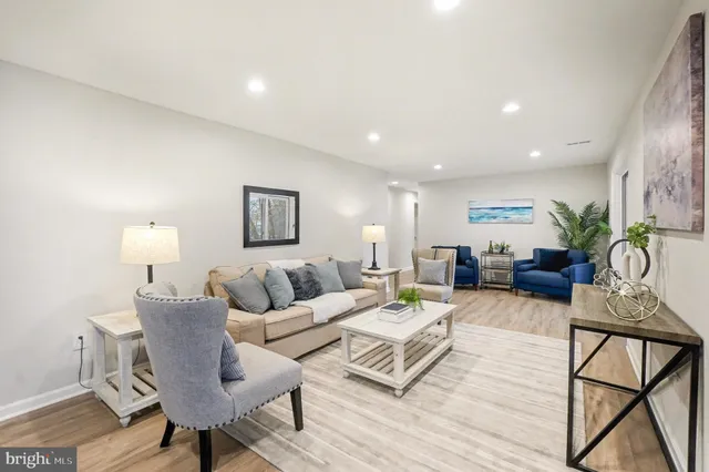 a view of a roof deck with wooden fence and floor