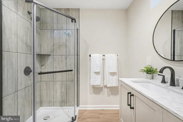 a front view of house with yard and trees