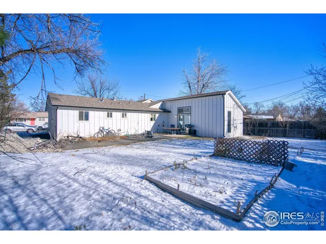 a house view with a backyard space