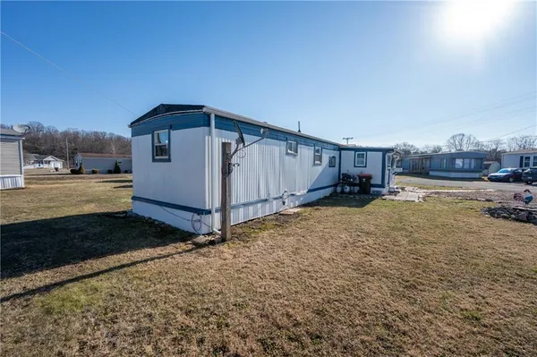 a view of a backyard of the house