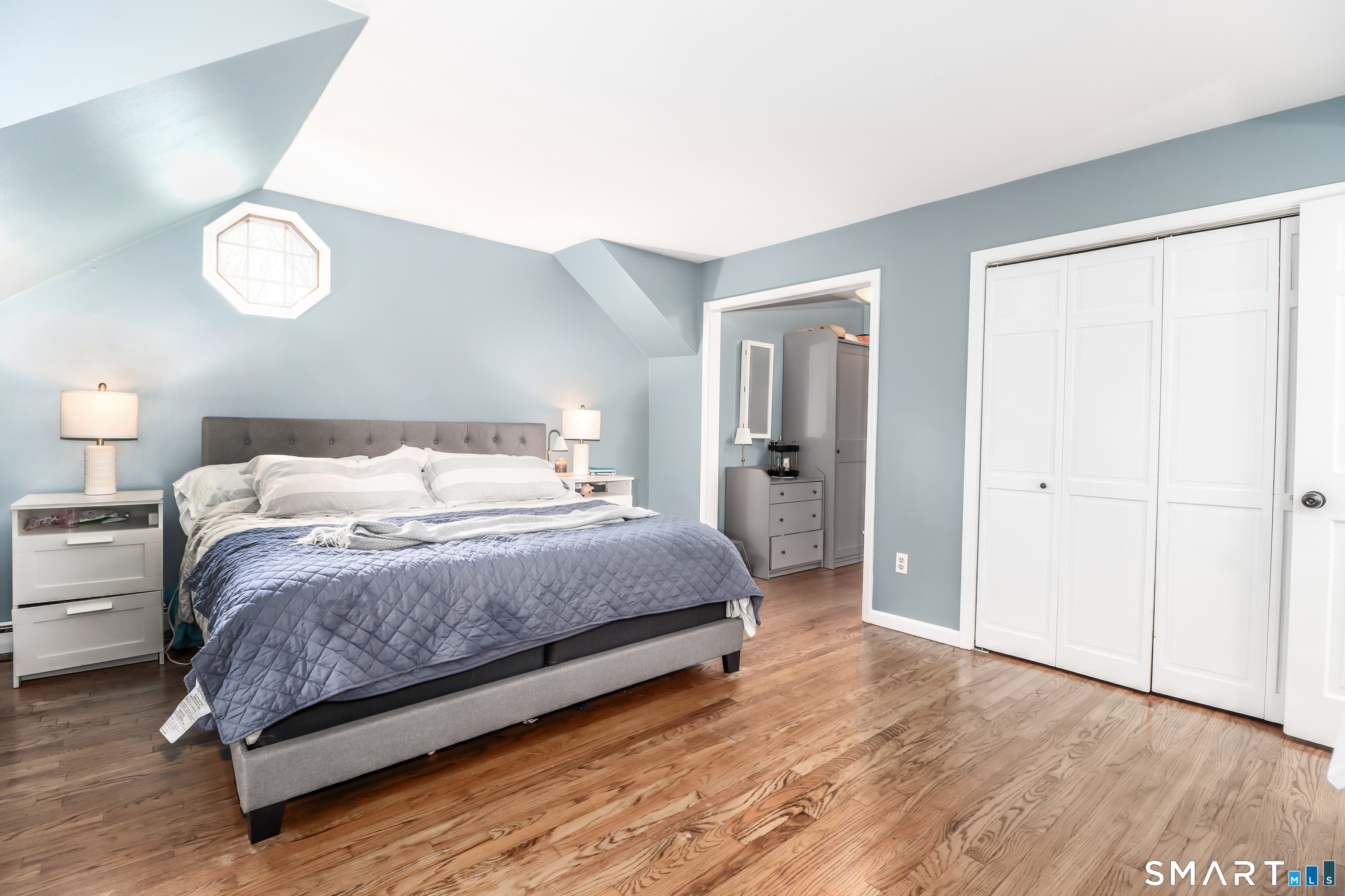 20 Puritan Valley Road Brookfield, CT 06804 - Photo 19 of 35 a bedroom with a bed and painting on the wall