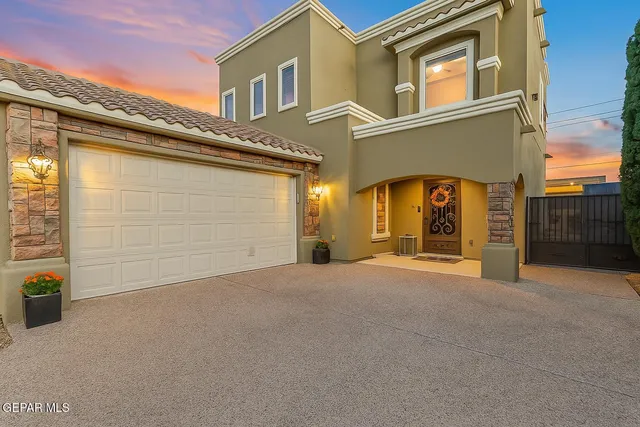 a view of a house with a garage