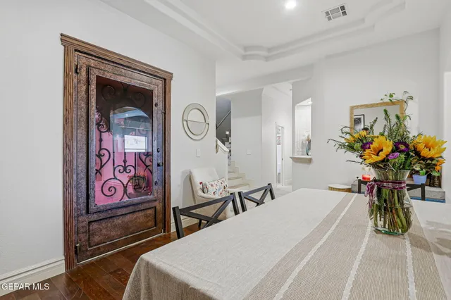 a kitchen with stainless steel appliances granite countertop a stove refrigerator and cabinets
