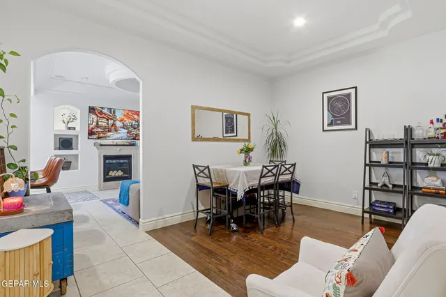 a dining room with furniture and window