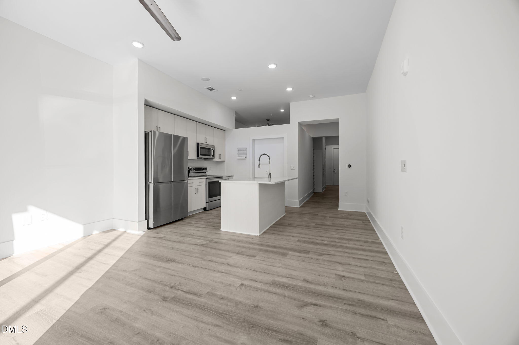 2441 Campus Shore Drive, Unit 109A Raleigh, NC 27606 - Photo 8 of 48 living and kitchen