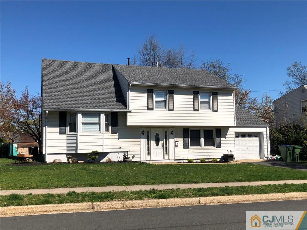 13 Phillips Road Edison, NJ 08817 - Photo 1 of 25 a front view of a house with a yard