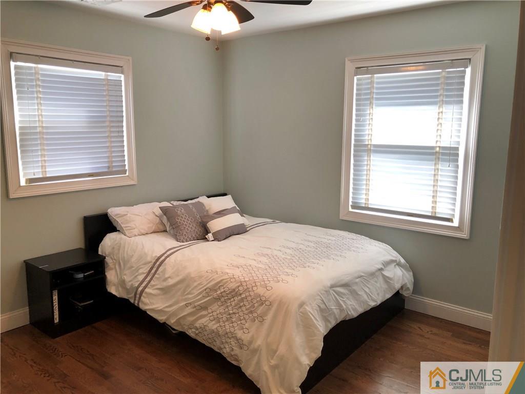 13 Phillips Road Edison, NJ 08817 - Photo 13 of 25 a bedroom with a bed and a window
