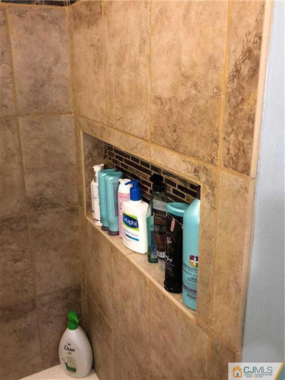 13 Phillips Road Edison, NJ 08817 - Photo 16 of 25 a view of entryway with shower
