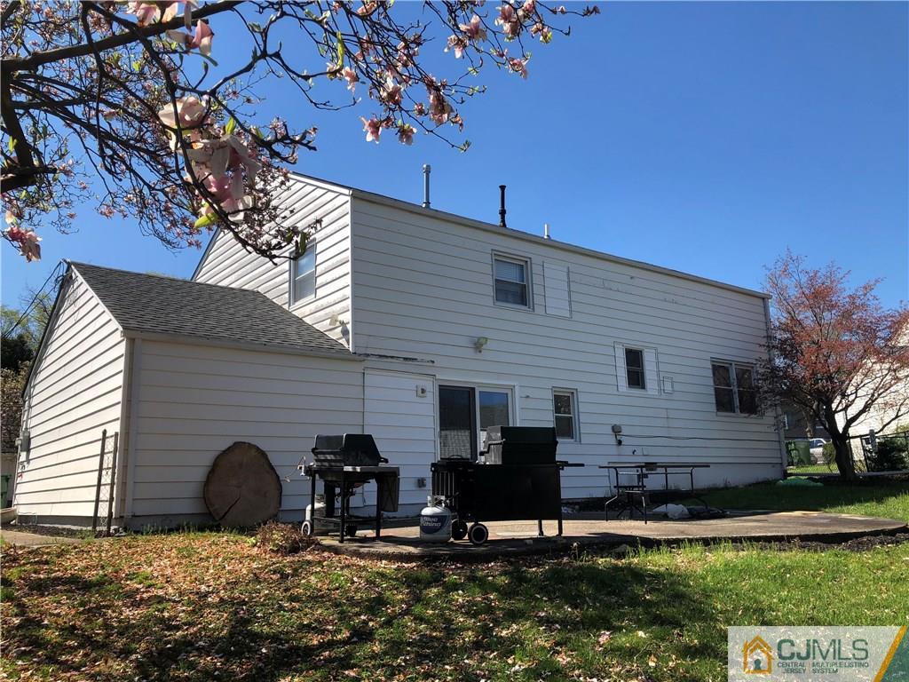 13 Phillips Road Edison, NJ 08817 - Photo 24 of 25 a view of a house with backyard and sitting area
