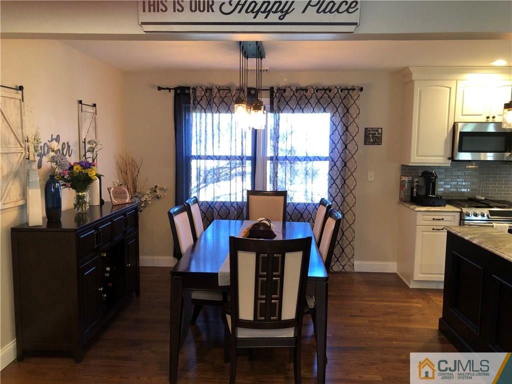 13 Phillips Road Edison, NJ 08817 - Photo 9 of 25 a view of a dining room with furniture and window