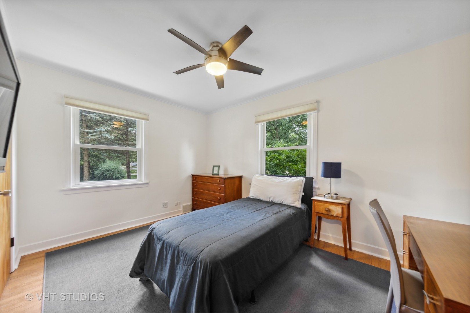 831 Warrenville Road Wheaton, IL 60189 - Photo 11 of 26 a bedroom with a bed and a window